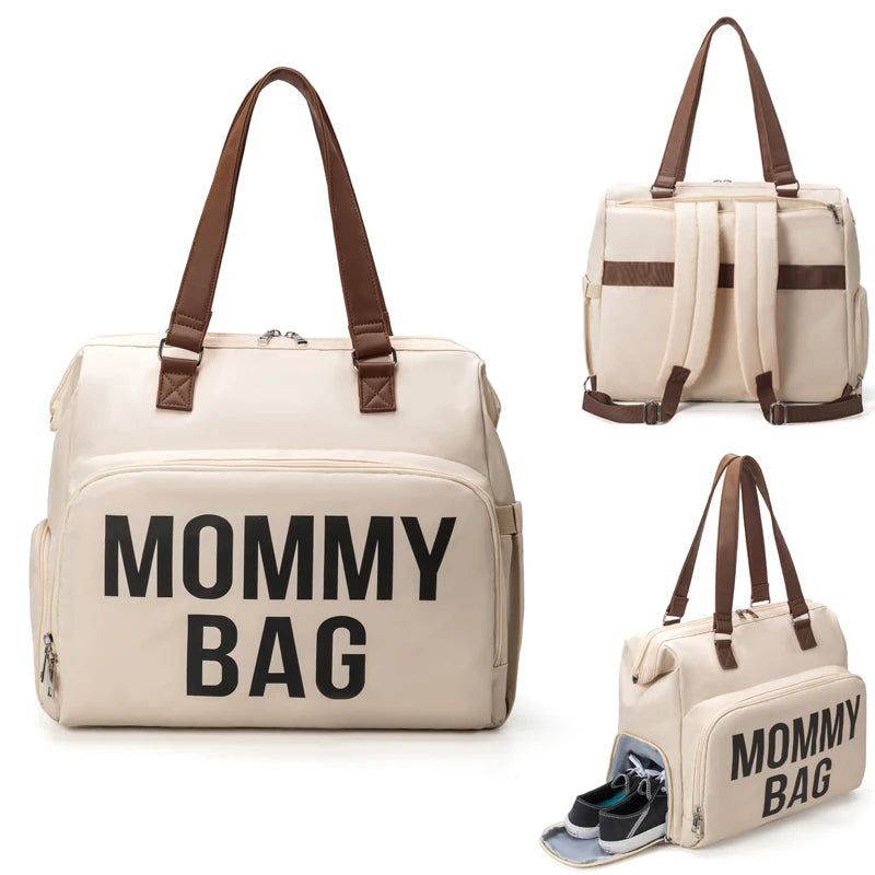 Grand Sac à Langer Mommy Bag allie style et praticité pour les mamans actives, idéal pour transporter les essentiels.
