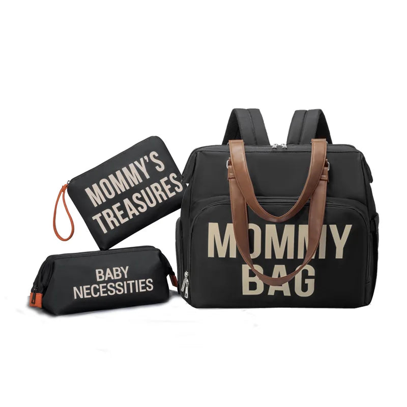 Découvrez le Grand Sac à Langer Mommy Bag, élégant et pratique pour toutes les mamans actives.